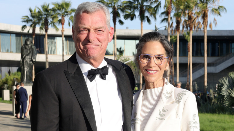 Jami Gertz and Tony Ressler pictured smiling at the LACMA in 2026