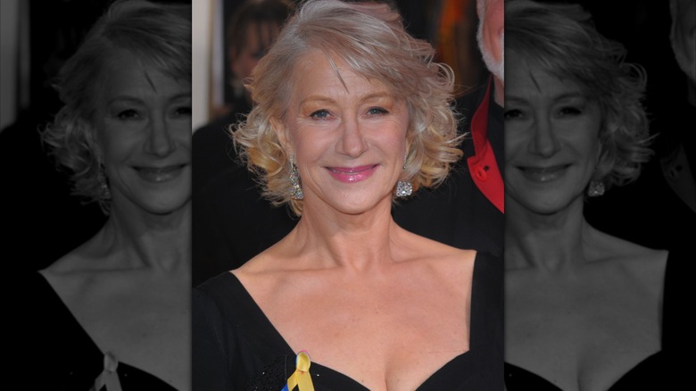 Helen Mirren smiling on the red carpet in 2010