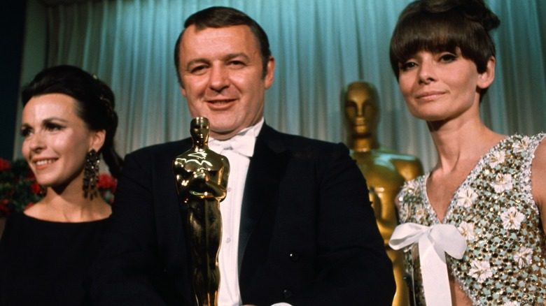 Actor Rod Steiger with his wife Claire Bloom and Audrey Hepburn
