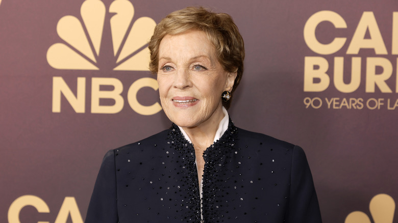 Julie Andrews wearing a sequin black jacket