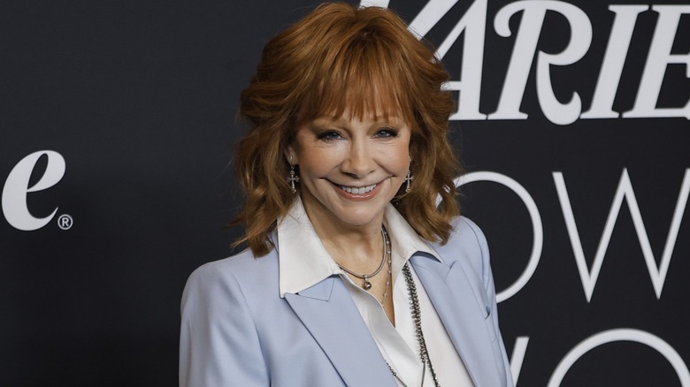 Reba McEntire smiling on the red carpet