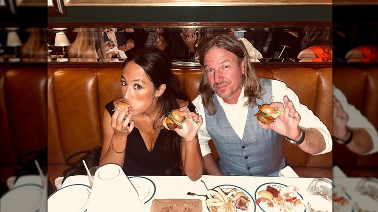 Joanna and Chip Gaines celebrating the launch of Magnolia Network at dinner