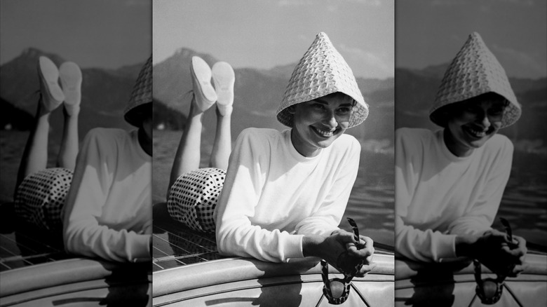 Audrey Hepburn on a boat in Switzerland