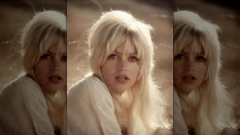 Goldie Hawn poses with messy platinum blonde hair