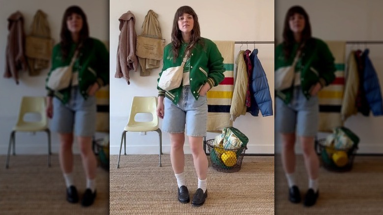 Varsity jacket with denim shorts