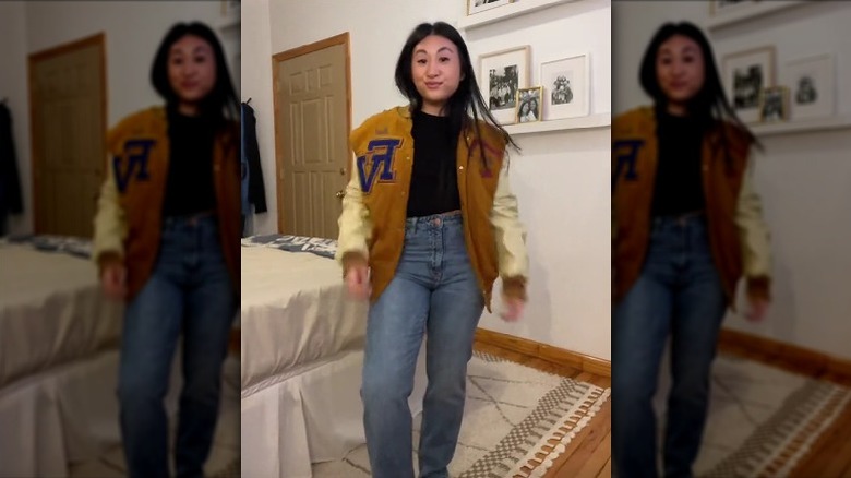 Varsity jacket over black top
