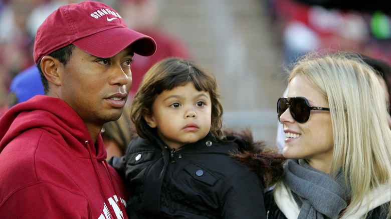Sam Woods pictured with parents Tiger Woods and Elin Nordegren