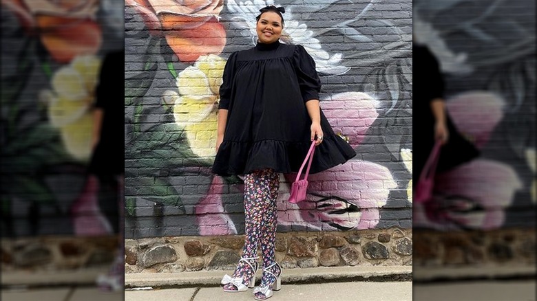 Woman wearing dark floral tights