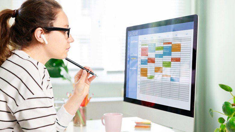 woman staring at computer