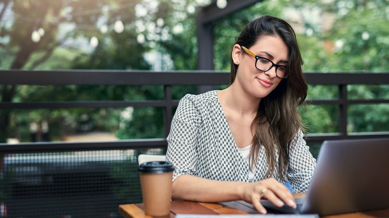 woman staring at computer