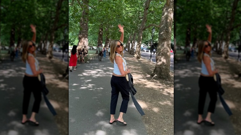 Jennifer Aniston in a park in summer 2025