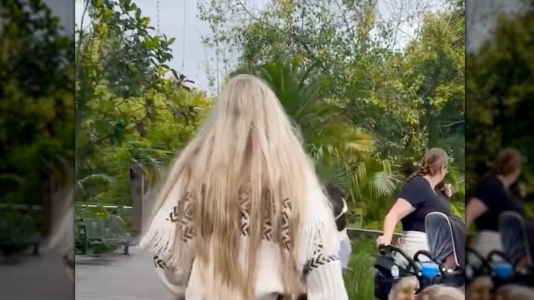 The back of Erika Kirk's head while walking at the zoo