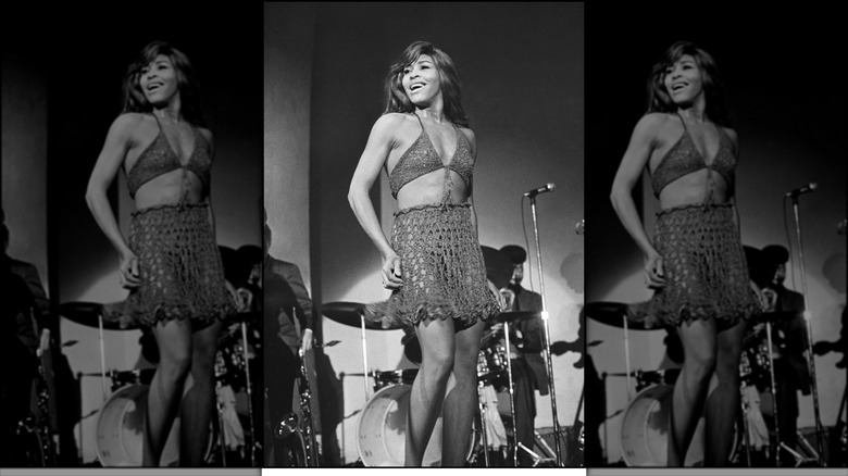 Tina Turner in a crochet outfit on stage