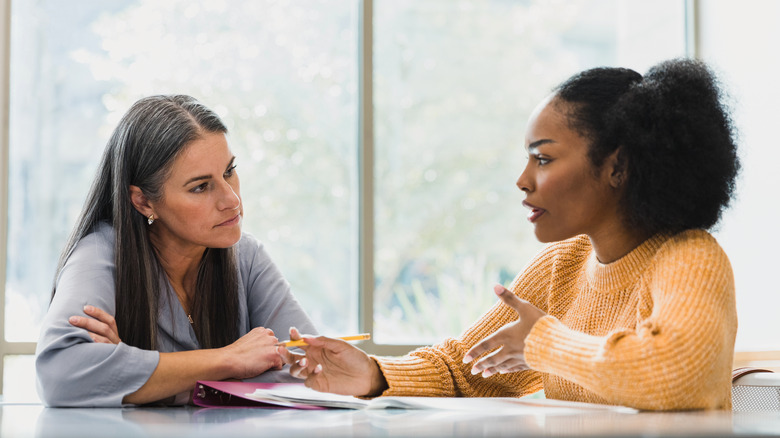 Two women talking 