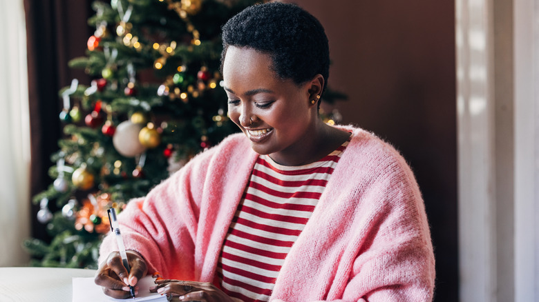 Woman writing notes