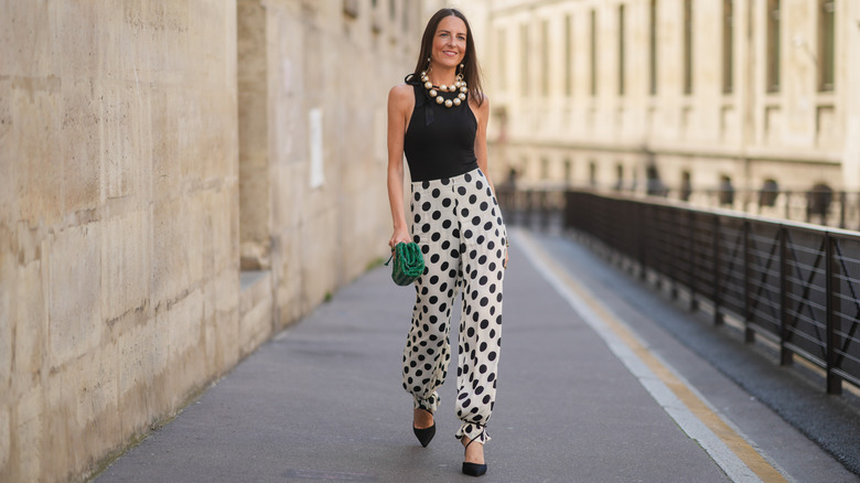 Tips For Wearing Pants While Still Nailing A Cocktail Dress Code
