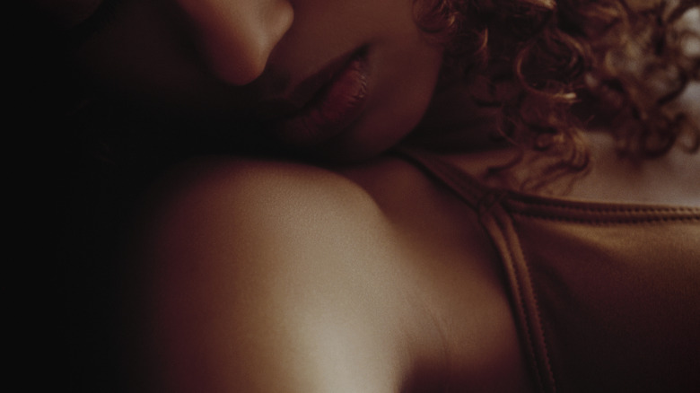 Woman sleeping in bra