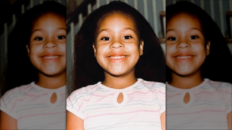 Sheinelle Jones smiling aged 6