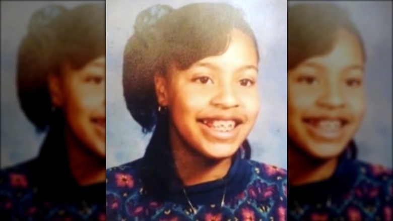 Young Sheinelle Jones smiling