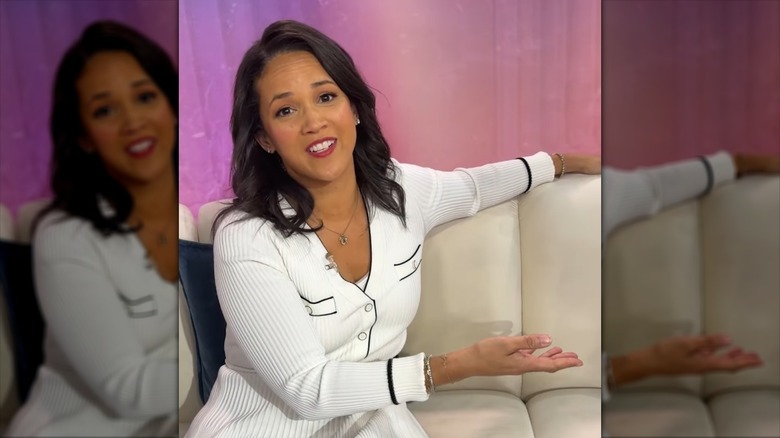 Laura Jarrett in a white dress, sitting on the Today sofa in 2026