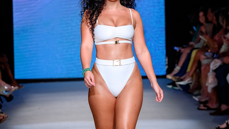 White bikini at fashion show