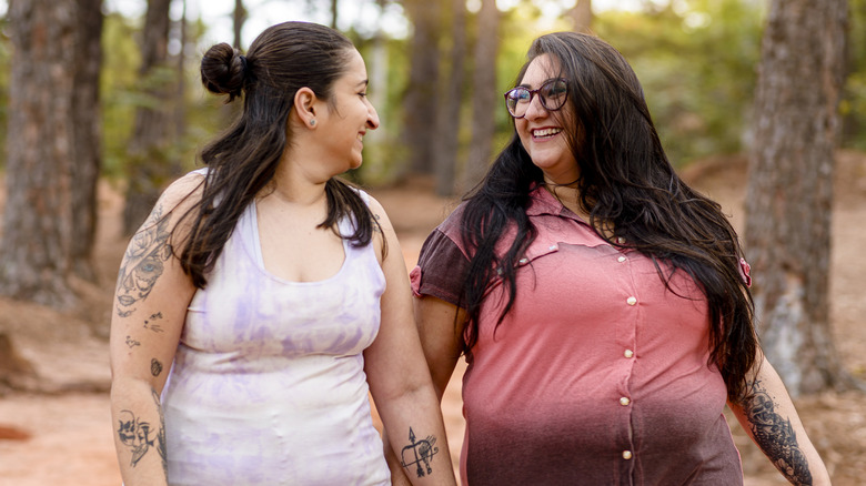 Queer couple in forest