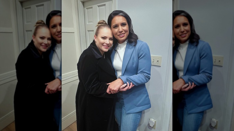 Tulsi Gabbard and Meghan McCain hugging in January 2025