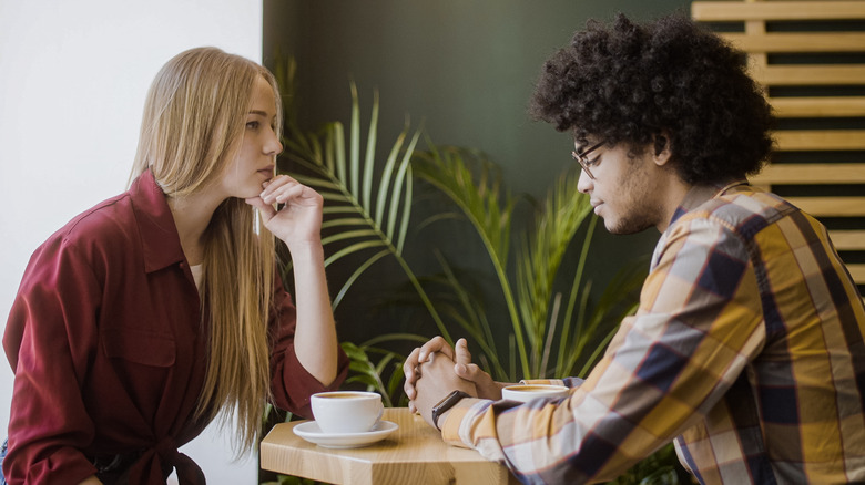 A couple together at a cafe 