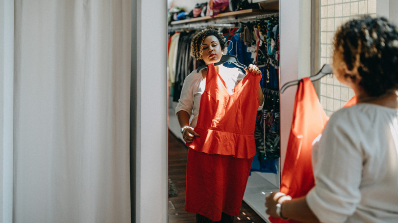 Woman looking at clothing in a store