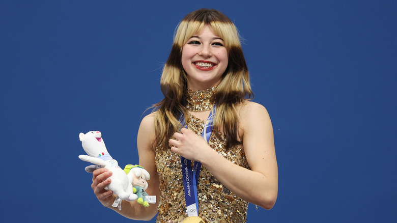 Alysa Liu celebrates on the podium during the medal ceremony for the Women's Single Skating on day thirteen of the Milano Cortina 2026 Winter Olympic games at Milano Ice Skating Arena on February 19, 2026 in Milan, Italy