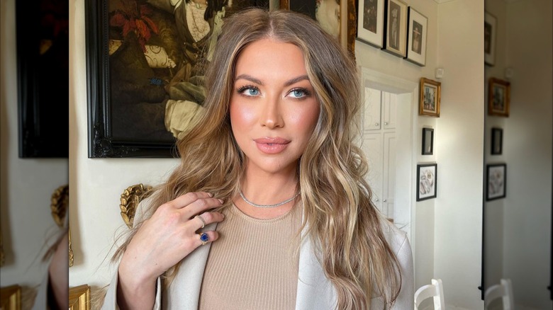 Stassi Schroeder with long wavy hair