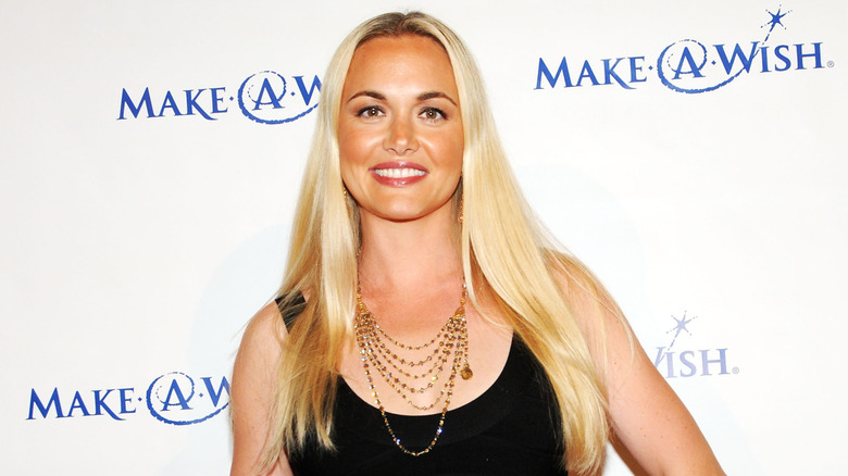 Vanessa Trump smiling in front of a step-and-repeat