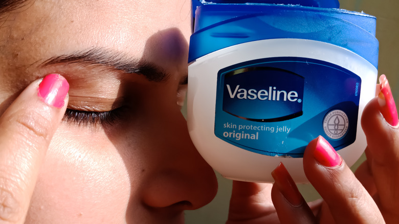 Putting Vaseline on skin