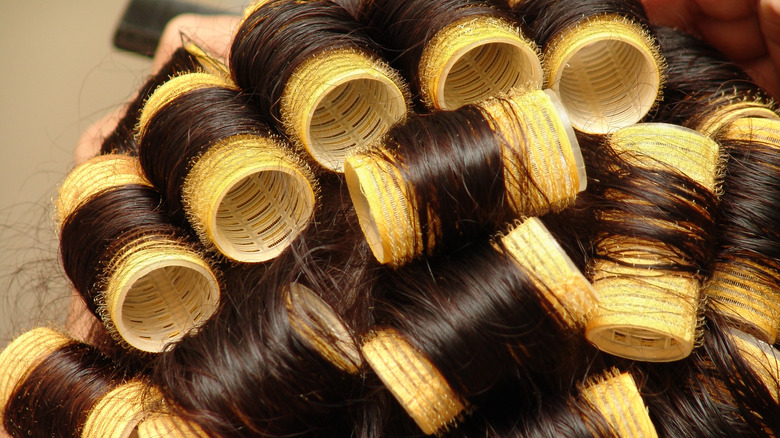 Velcro hair rollers in hair