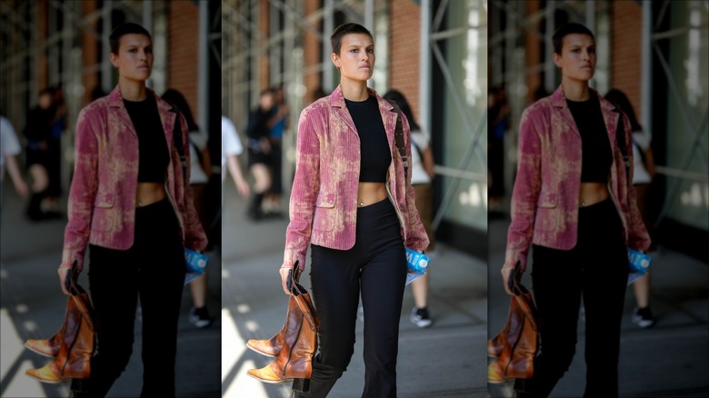Guest wearing corduroy jacket over pants