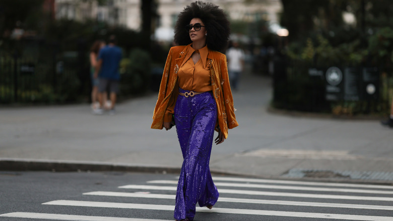 Woman in yellow velvet top