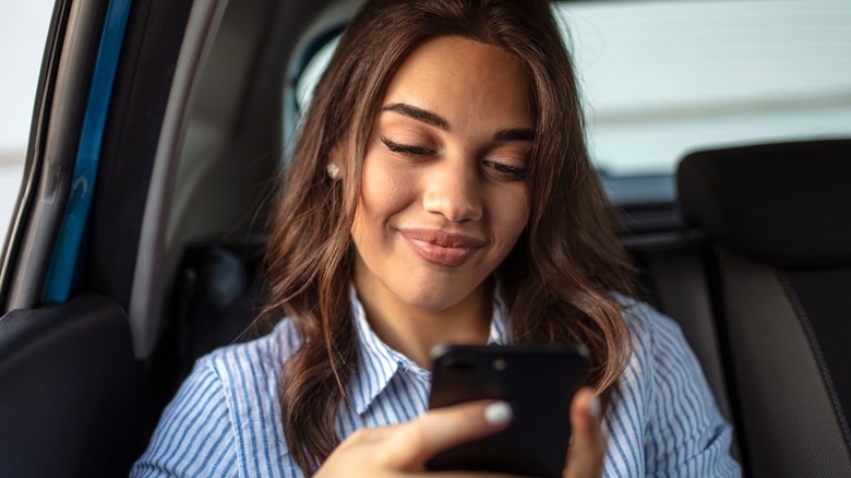 Woman traveling in a cab