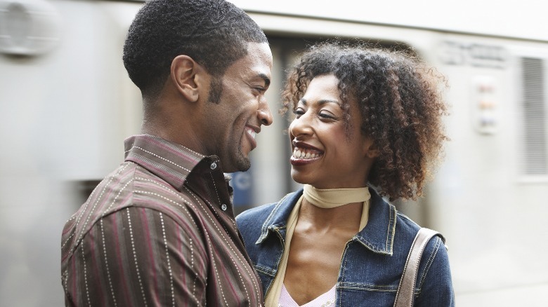 Couple on a date as a train passes by
