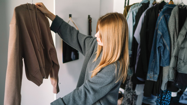 Woman looking at winter clothes