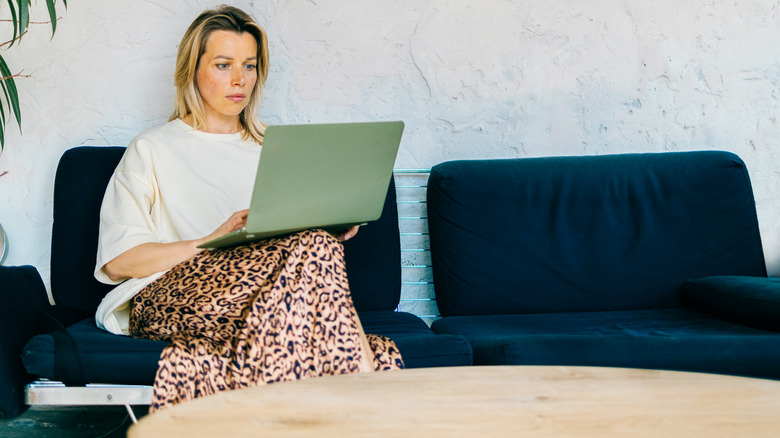 Woman wearing leopard print skirt