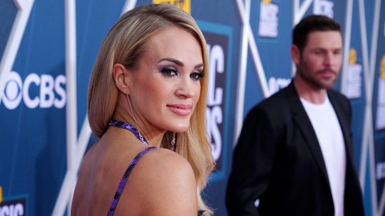 Carrie Underwood and Mike Fisher on the red carpet