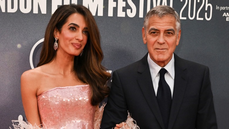 Amal Clooney with George Clooney on the red carpet
