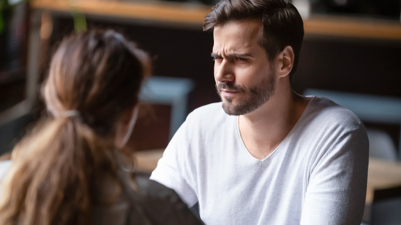 man annoyed on date