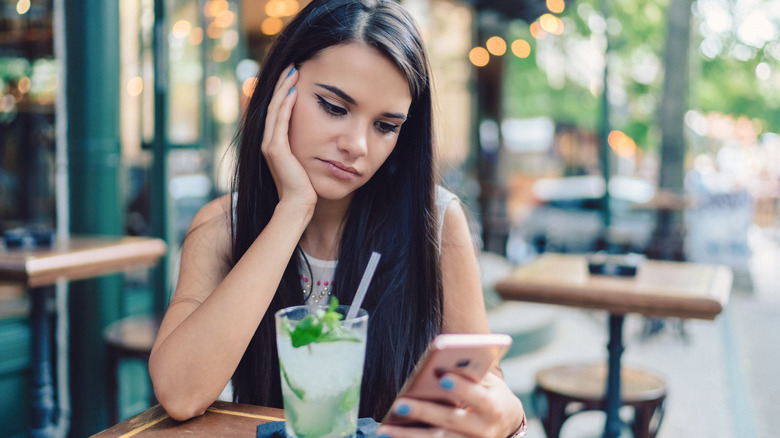 a woman looking bored 