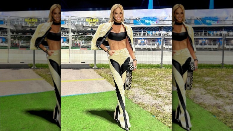 Woman posing at F1 match