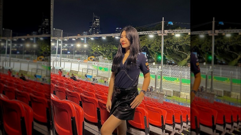 Woman wearing F1 top