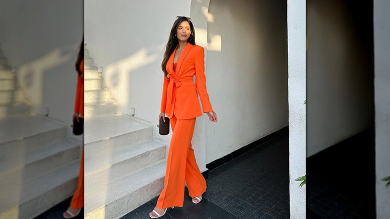 Wearing orange suit