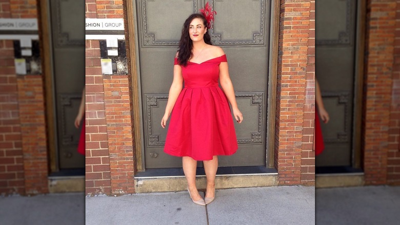 Wearing red dress