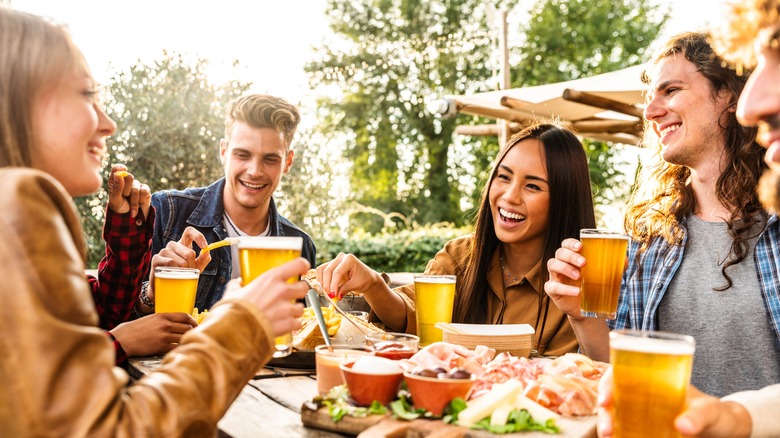 people drinking beer outside