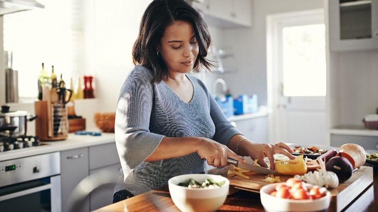 Woman cooking dinner